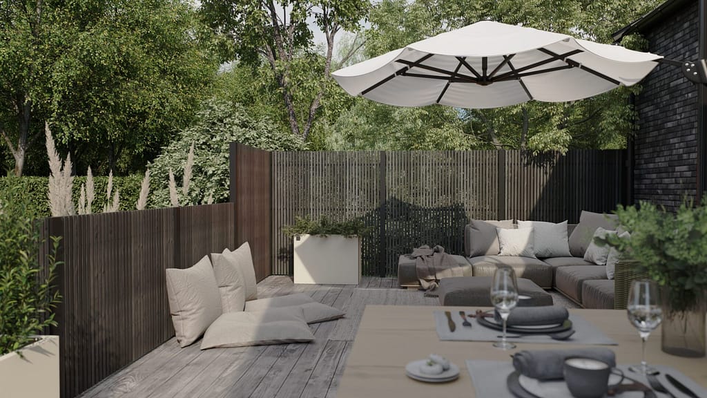 Högt staket med stående ribbor som är svarta