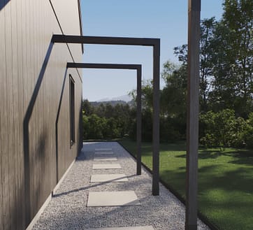 En snygg pergolagång som ramar in trädgården.