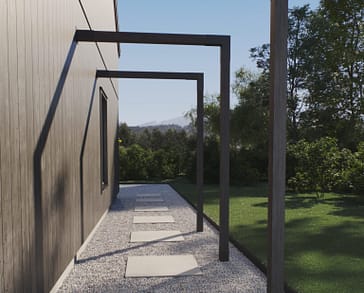 En snygg pergolagång som ramar in trädgården.